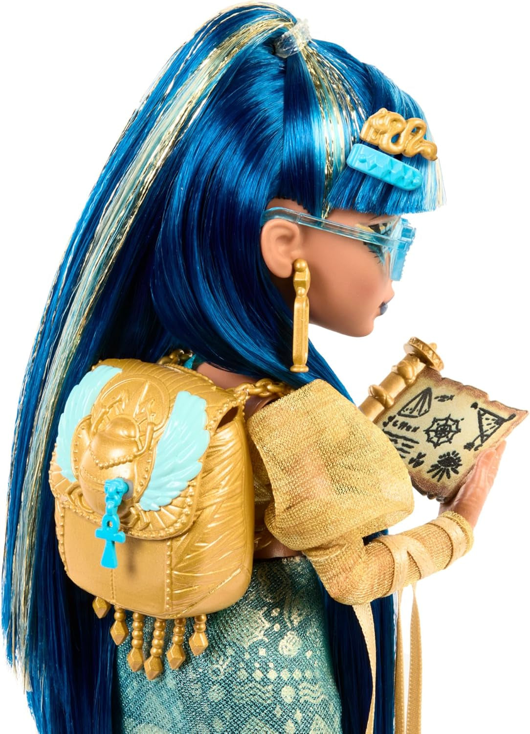 Monster High Cleo De Nile-Puppe in einer goldenen Bluse und einem mehrlagigen Rock, inklusive der Hissette-Kobra und Accessoires wie einer Schultasche, einem Snack und einer Rolle Toilettenpapier, HXH74