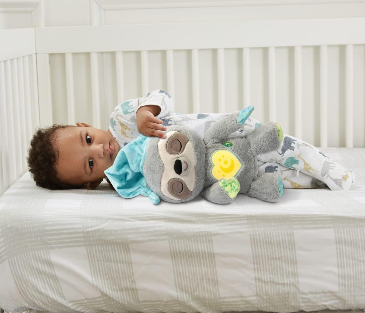 VTech Baby Schnarchi, das schläfrige Faultier – Süßes Plüschtier, das Ihnen beim Einschlafen hilft – Mit natürlichen und alltäglichen Geräuschen, Musik und Nachtlicht – Für Babys ab der Geburt Bebe Toys Naty Shop