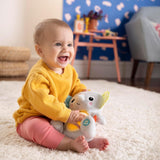 Bright Starts, Spielzeug-Elefantenbaby zum Umarmen mit Lichtern, Liedern, verschiedenen Texturen und mehr, mehrfarbig Toys Bebe Naty Shop