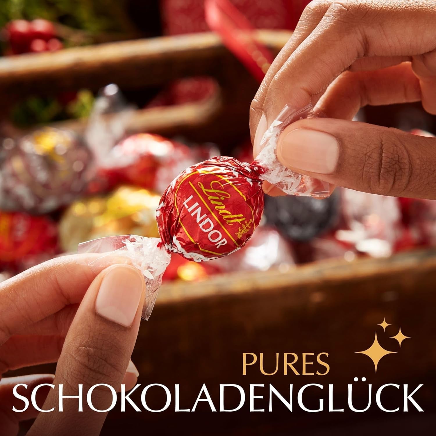 Klassisches Sortiment an Lindt-Schokoladenkugeln LINDOR | ca. 80 Kugeln Schokolade (Milch, Weiß, Zartbitter 60 %, Haselnuss) | Großpackung, 1 kg