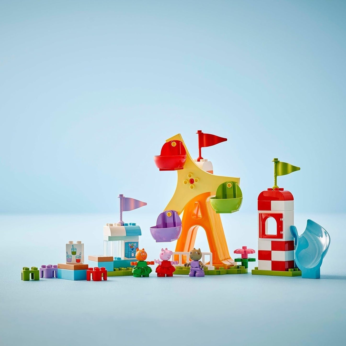 LEGO DUPLO Peppa Wutz Kirmes – Kinderspielzeug und Motorikspielzeug ab 2 Jahren – Vorschulspiele mit Riesenrad, Rutsche und 3 Figuren inklusive Mollie Kitty und Klausi Kläff – Geschenk für Kinder 10453 Bausets Besuchen Sie den LEGO-Store