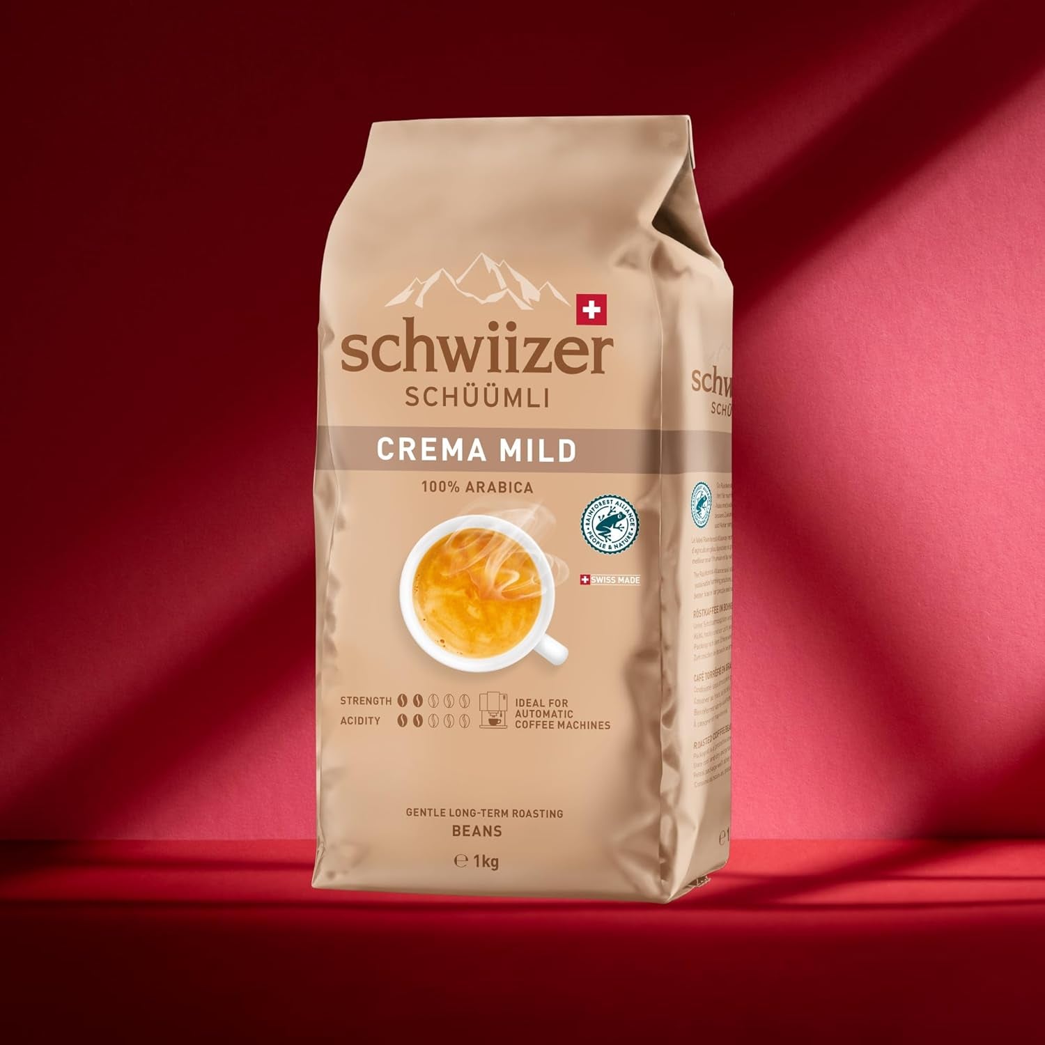 Schwiizer Schüümli Crema Mild, 100% Arabica-Kaffeebohnen fein, harmonisch und mild, ideal für automatische Espressomaschinen, Stärke 2/5, helle Röstung, Rainforest Alliance, 1kg