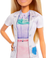 Barbie-Zahnarztpuppe, Modepuppe mit blonden Haaren, blauem Kleid und Laborkittel, 1 Kinderpuppe, Untersuchungszubehör und verschiedene Accessoires, JCR74